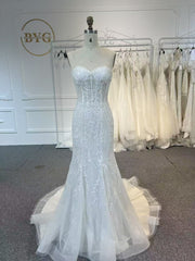 BYG504 A MERMAID DRESS PAIRED WITH A SMALL COAT.
