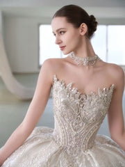 X25-81 A SUMPTUOUS STRAPLESS WEDDING DRESS FEATURING GILDED-LIKE EMBROIDERY