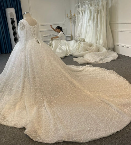 BYG24-22 SQUARE NECK SEQUIN GRID LACE WEDDING DRESS WITH BACK STRAP EU48 BYG24-22 SQUARE NECK SEQUIN GRID LACE WEDDING DRESS WITH BACK STRAP EU48