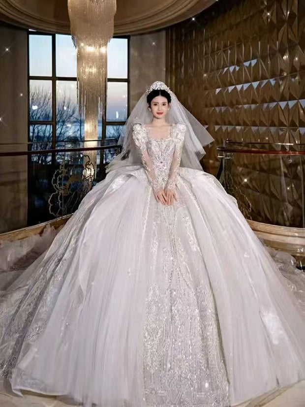 DIVINE 02 EXAGGERATED REGAL WITH LAXURIOUS LAYERS OF GATHERED TULLE WEDDING DRESS